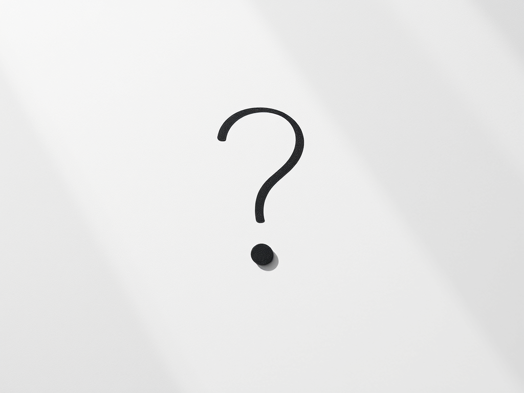 question mark drawn on paper with light shining from the left upper corner