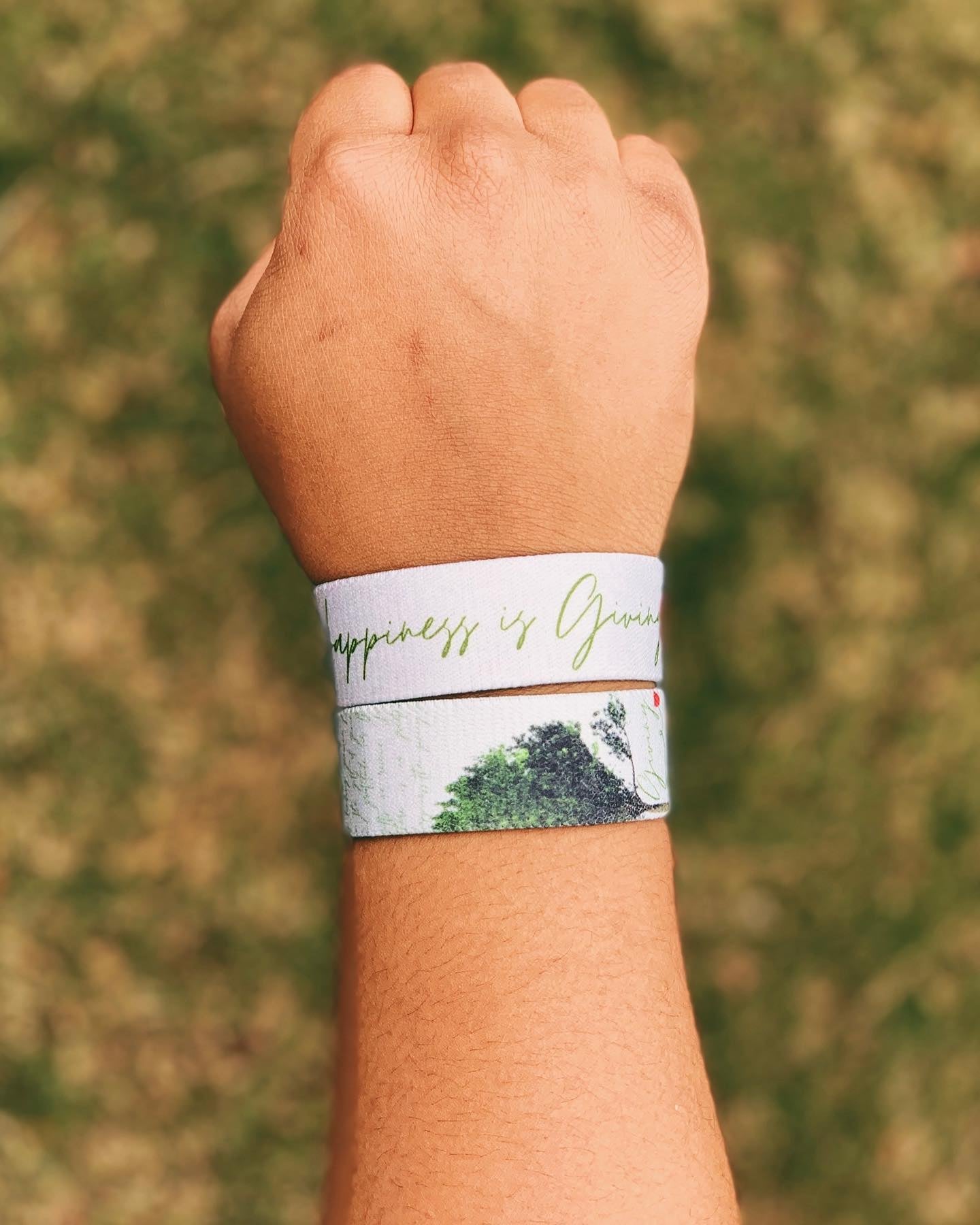 model wearing happiness is giving ZOX bracelet on right wrist